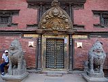 Kathmandu Patan Durbar Square 15 Two Snow Lions Guard The Golden Gate Sun Dhoka Entrance Doors to Patan Museum With the Gilded Torana Above